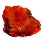 Photo of a Carnelian gemstone rock as it is found dug out of the earth.