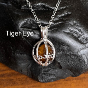 Photo of Sterling Silver Cage Pendant Containing The Tiger Eye Gemstone With Chain.